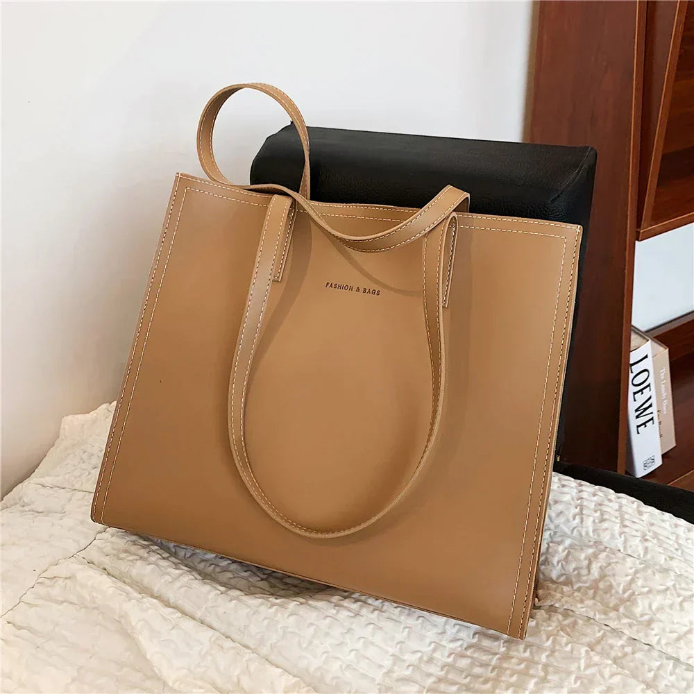 Sac à main femme cuir noir élégant grand modèle