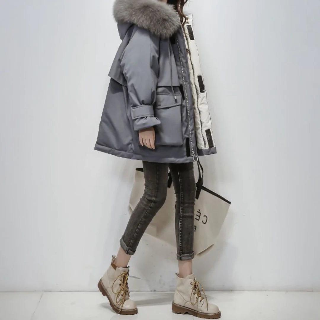 Veste en fourrure douce à capuche et poches pratiques