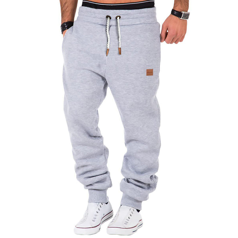 Pantalon de sport gris homme élastique