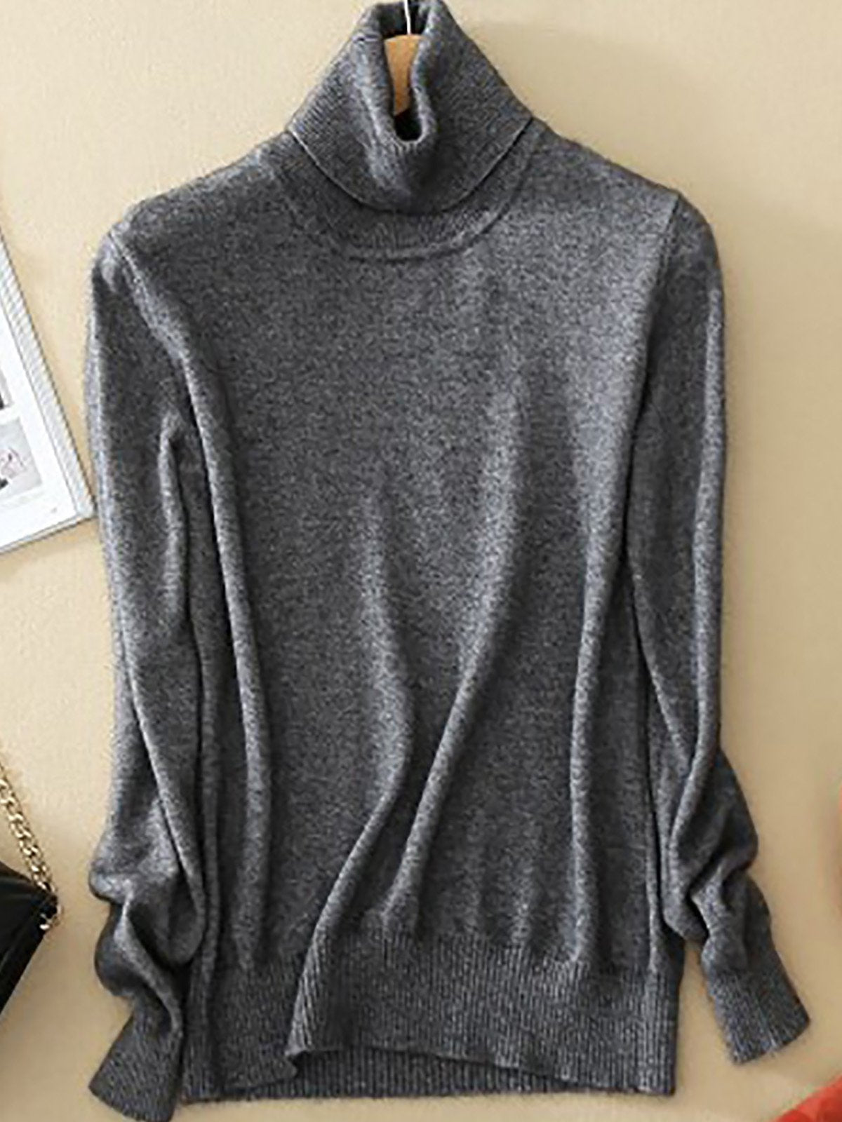Pull femme noir élégant col rond
