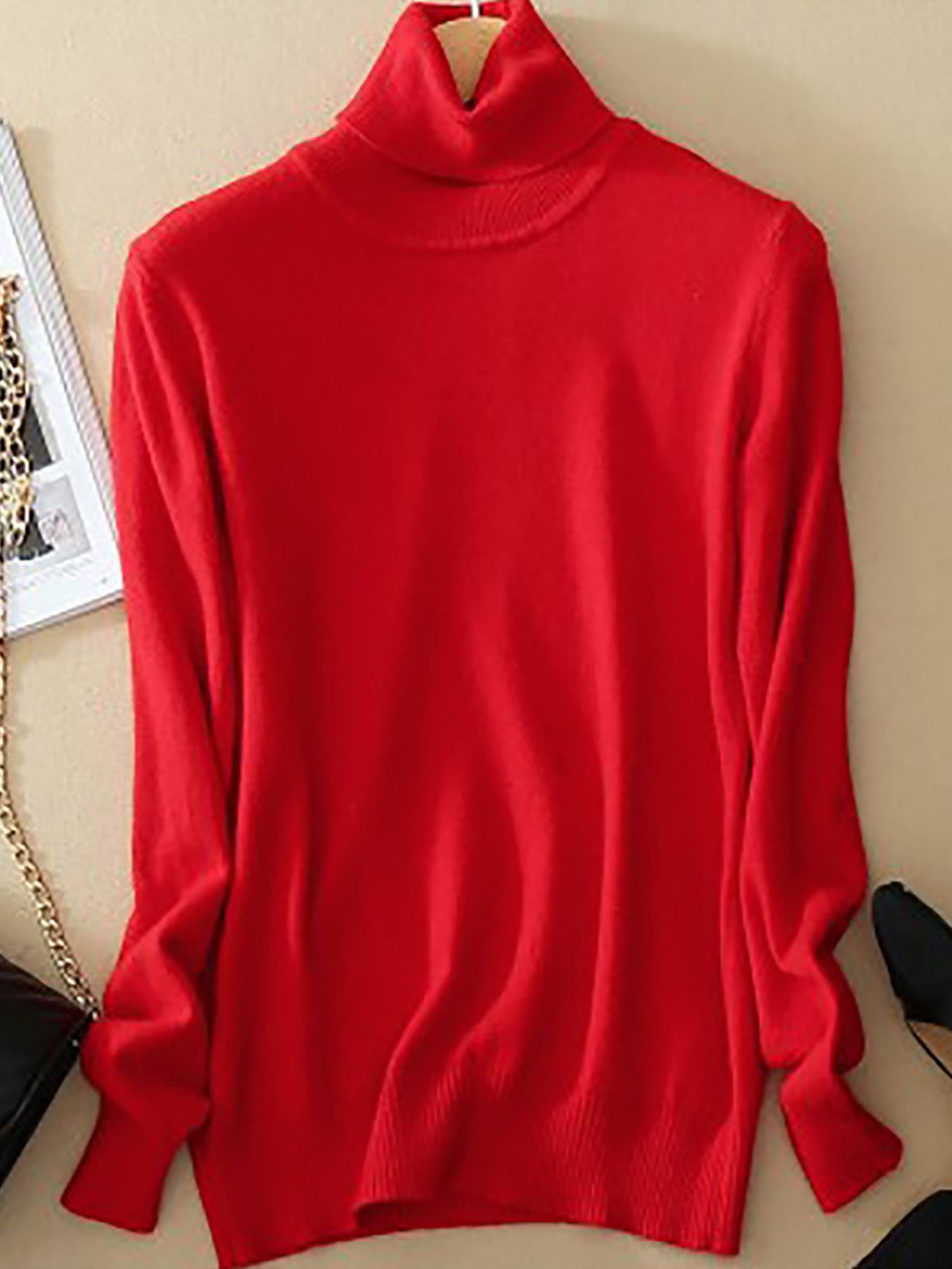 Pull femme noir élégant col rond