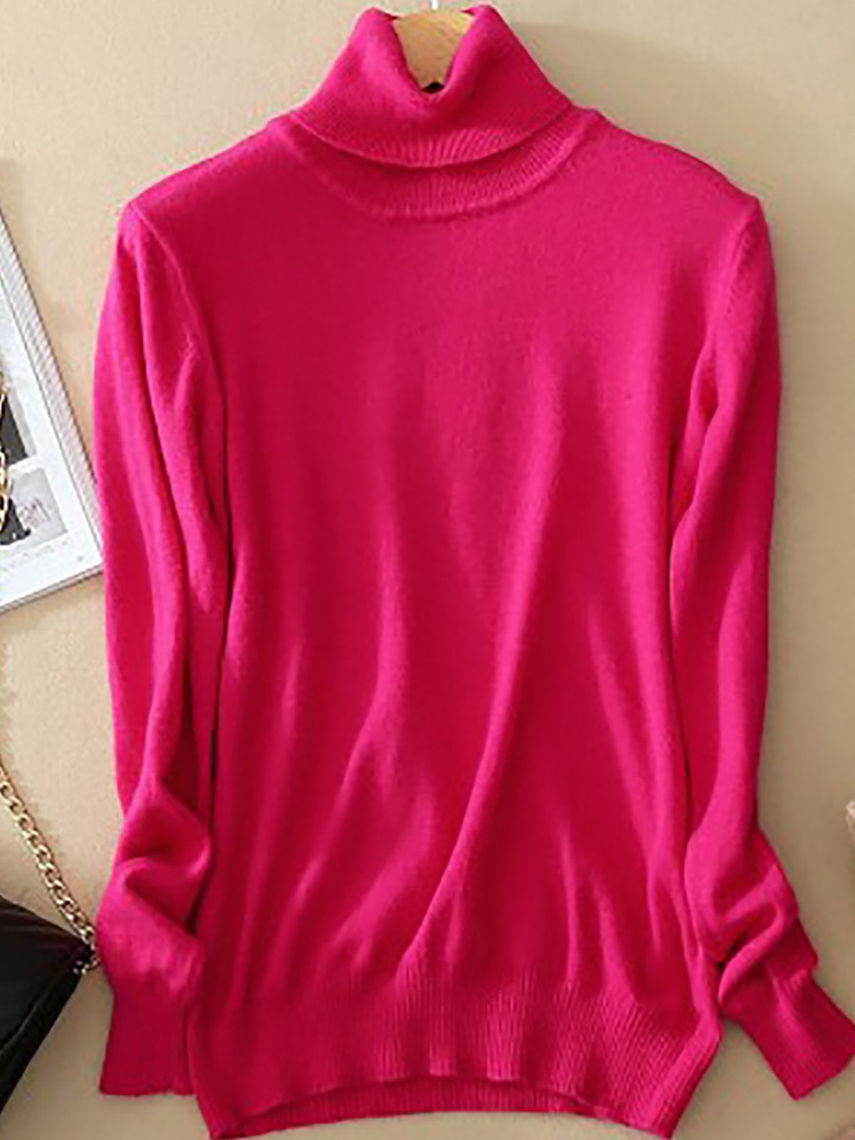 Pull femme noir élégant col rond