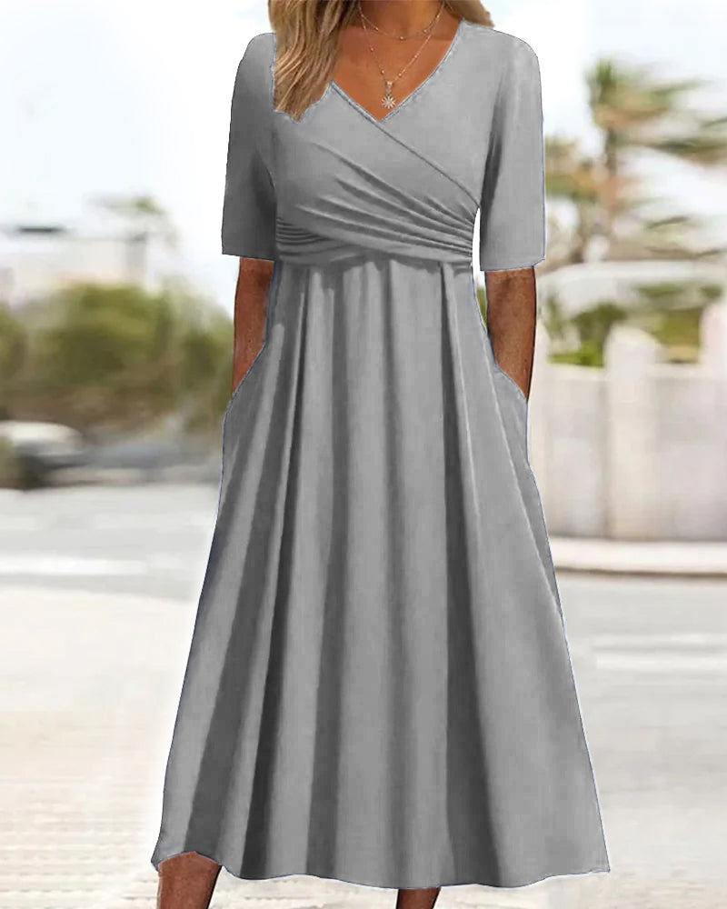 Robe femme chic mi-longue avec poches