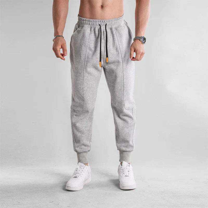 Pantalon de sport noir homme confort avec cordon et poches