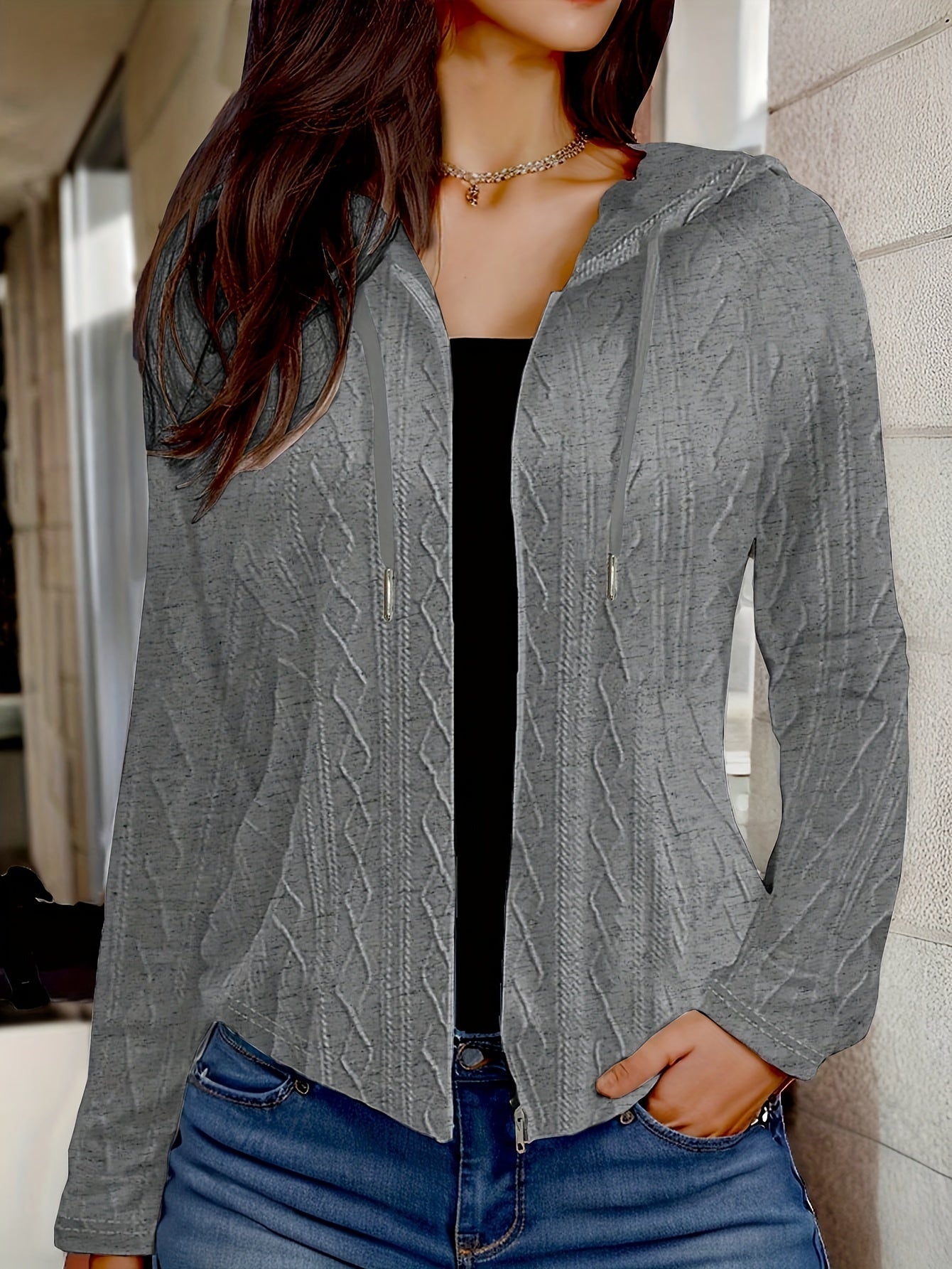 Veste en maille torsadée blanche femme