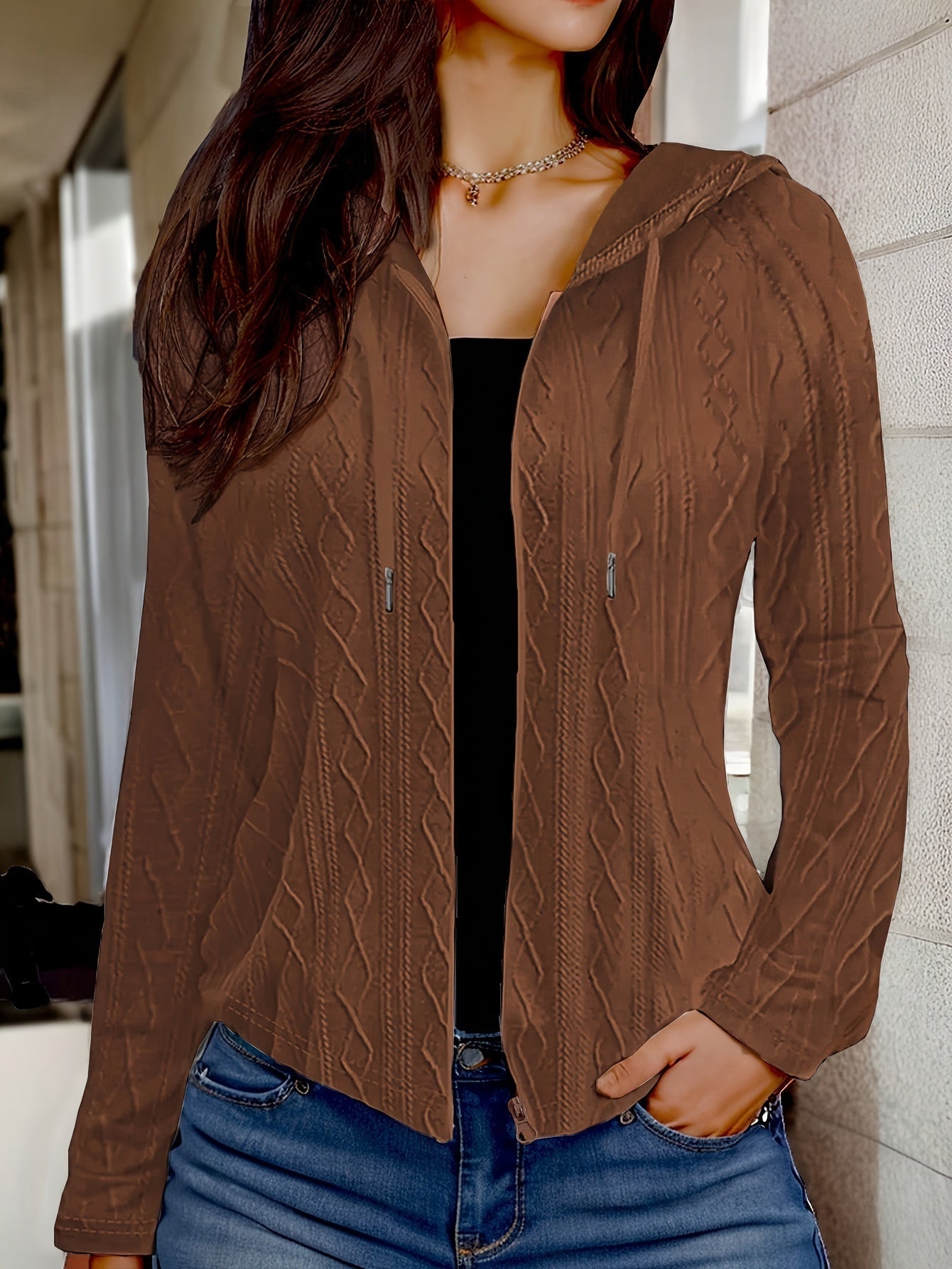 Veste en maille torsadée blanche femme