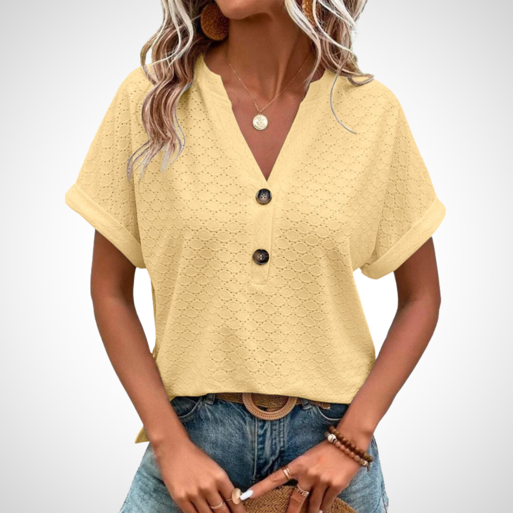 Blouse femme élégante manches courtes boutons noirs