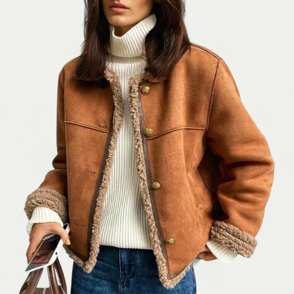 Veste courte en peau lainée bordée de fausse fourrure pour femme