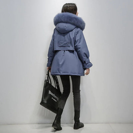 Veste en fourrure douce à capuche et poches pratiques - LuxeStyle