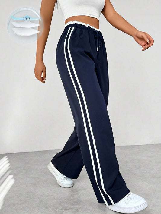 Pantalon de running femme marine à rayures contrastées - LuxeStyle