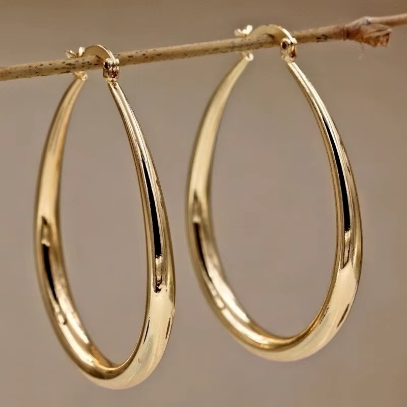 Boucles d'Oreilles Rondes Élégantes en Métal Texturé - LuxeStyle