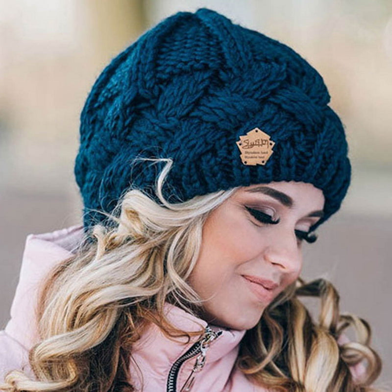 Chapeau tricoté femme torsadé élégant