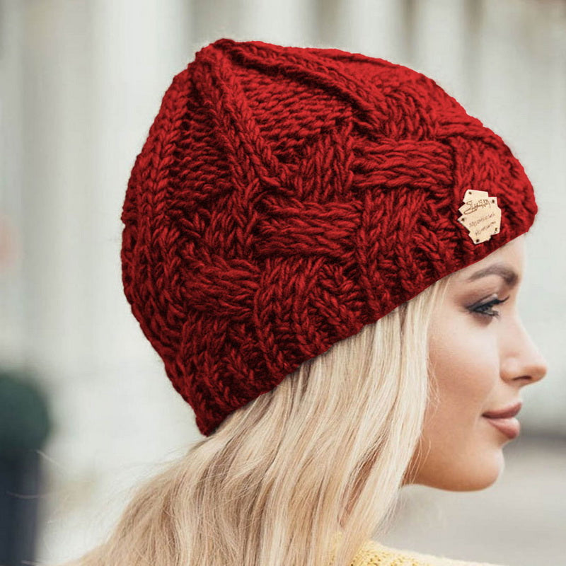 Chapeau tricoté femme torsadé élégant