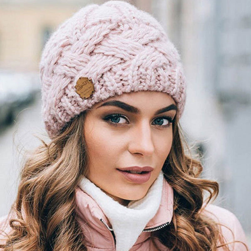 Chapeau tricoté femme torsadé élégant