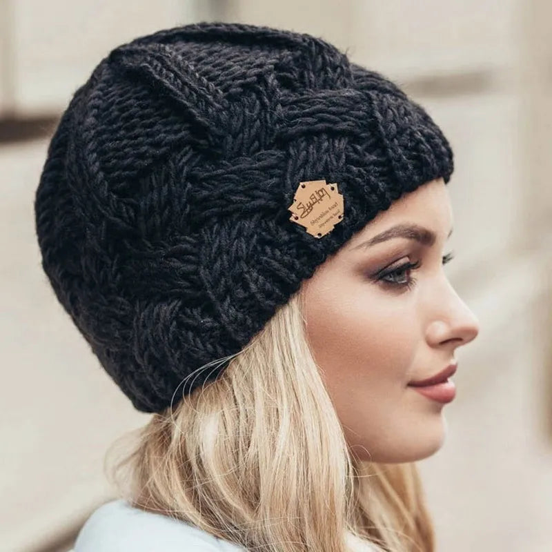 Chapeau tricoté femme torsadé élégant