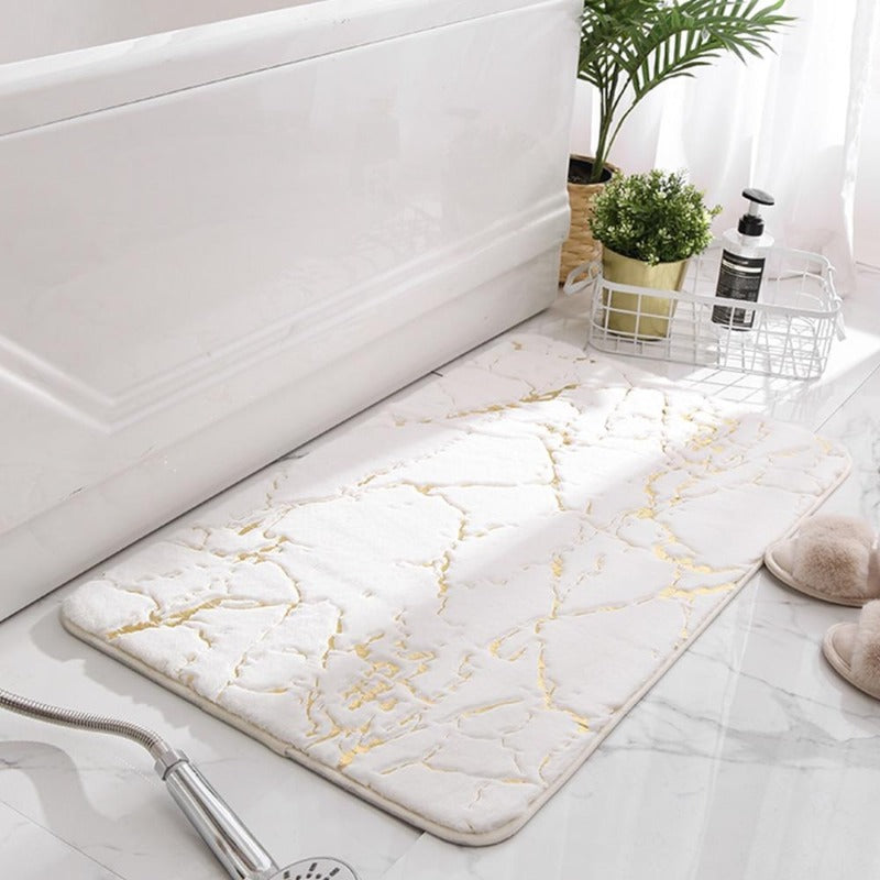 Tapis de bain sûr et chic avec motif or