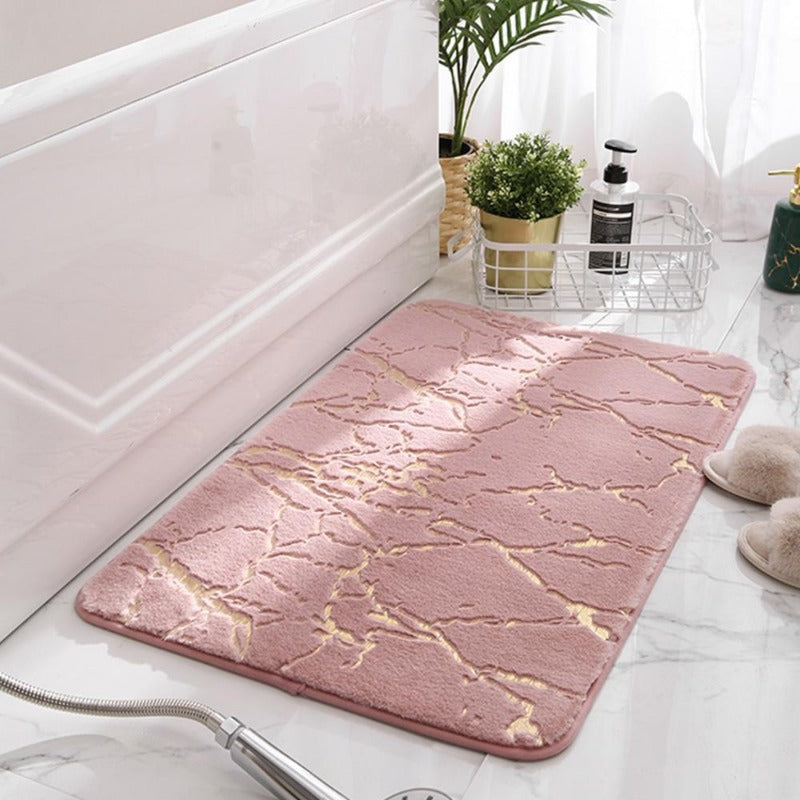 Tapis de bain sûr et chic avec motif or