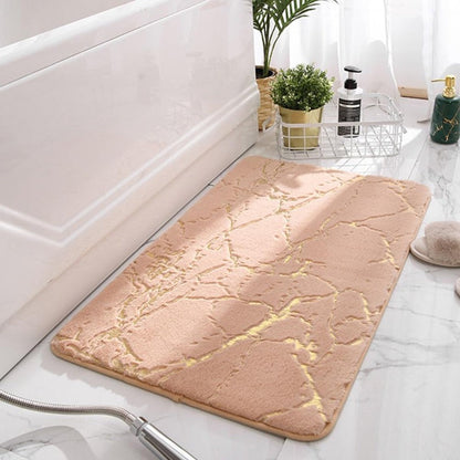 Tapis de bain sûr et chic avec motif or