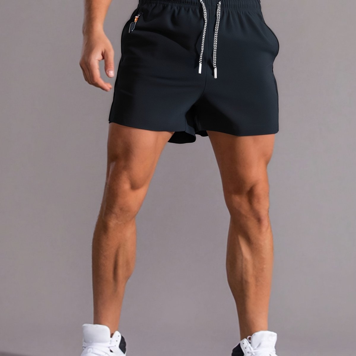 Short de sport confortable avec poches fermées et cordon ajustable